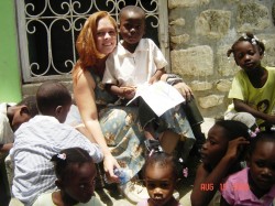 Meghan Lane with children in Carrefour, Haiti